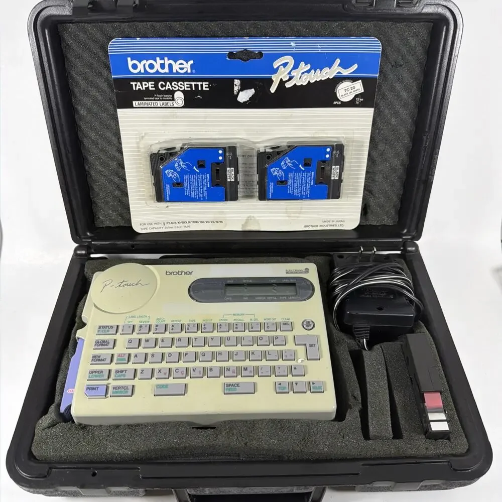 Brother P-Touch Label Maker Electronic Labeling System PT-25 w/ Tape & Case